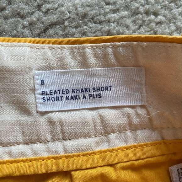 GAP High-Rise Pleated Khaki Shorts in Mustard Yellow - Picture 5 of 7